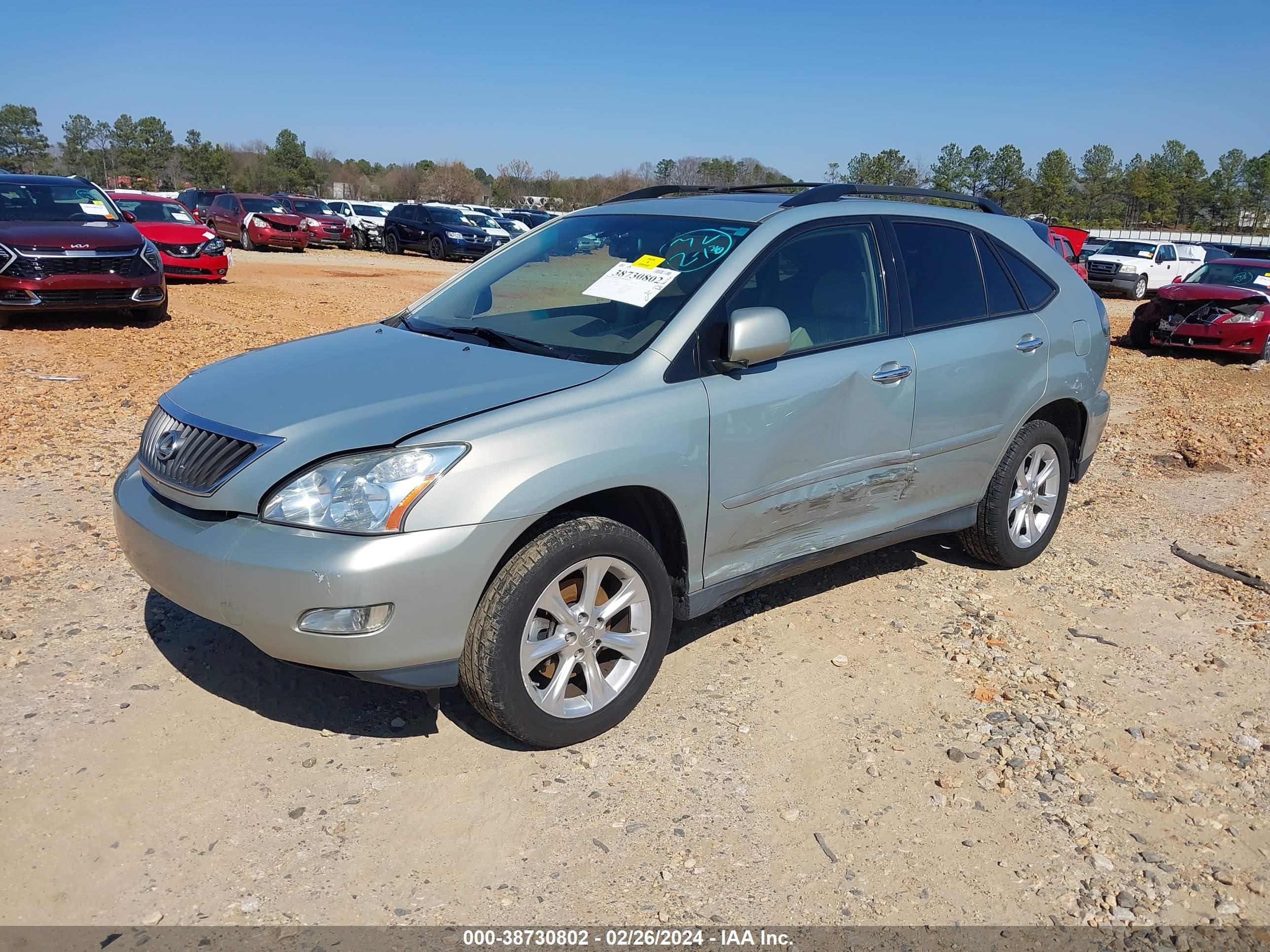 Photo 1 VIN: 2T2GK31UX9C068008 - LEXUS RX 