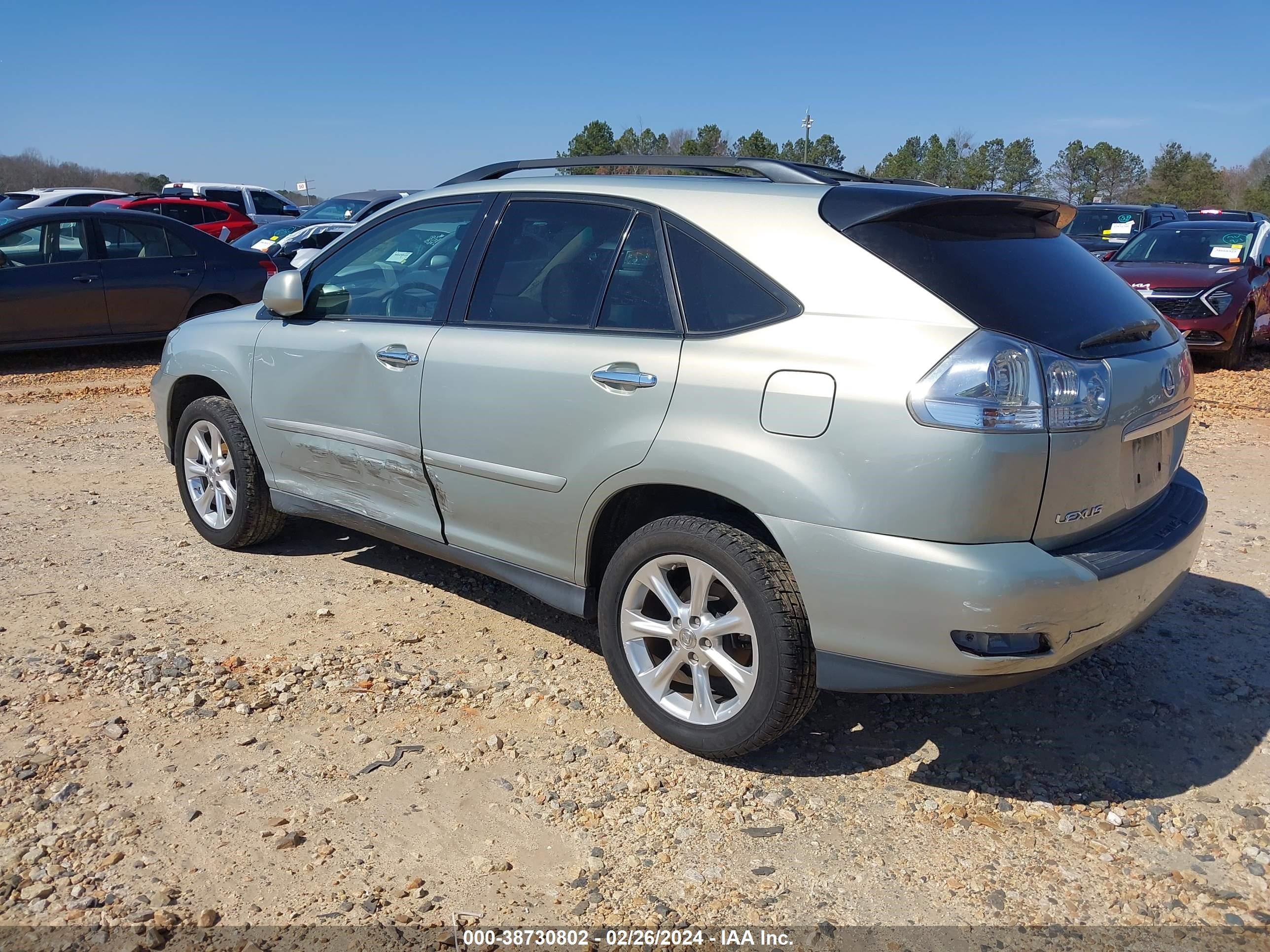 Photo 2 VIN: 2T2GK31UX9C068008 - LEXUS RX 