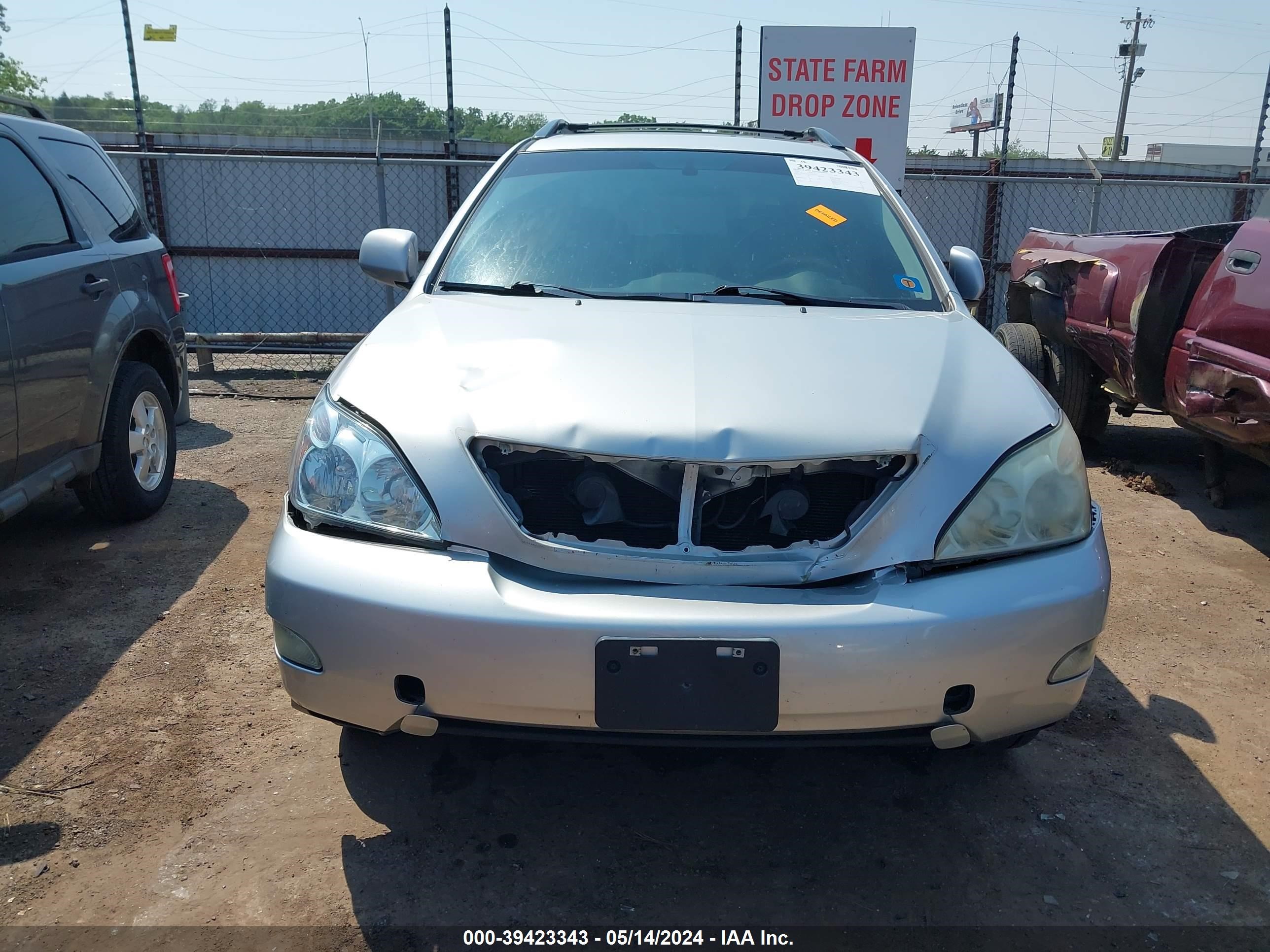 Photo 11 VIN: 2T2GK31UX9C076951 - LEXUS RX 