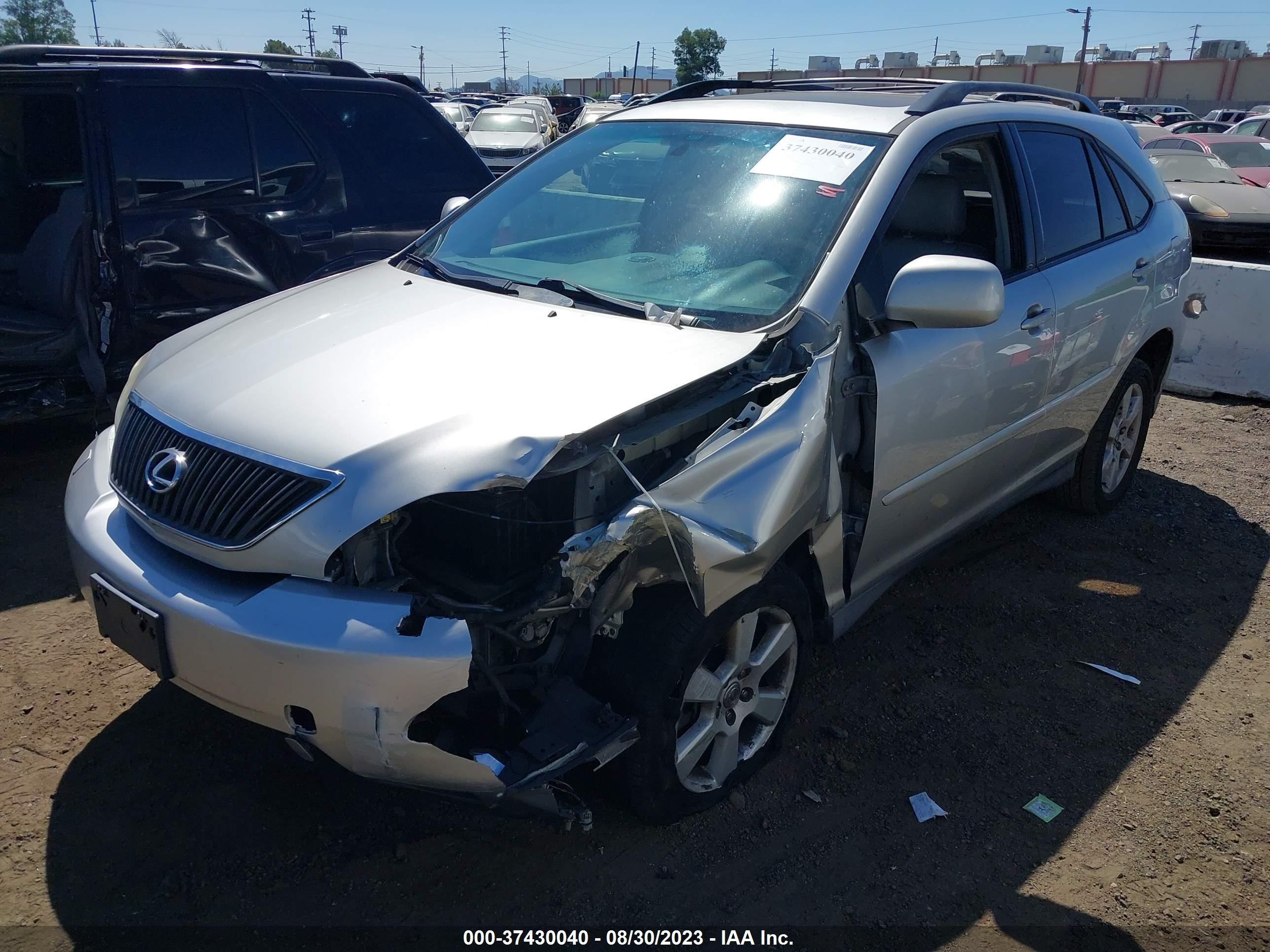 Photo 1 VIN: 2T2HA31U55C082240 - LEXUS RX 