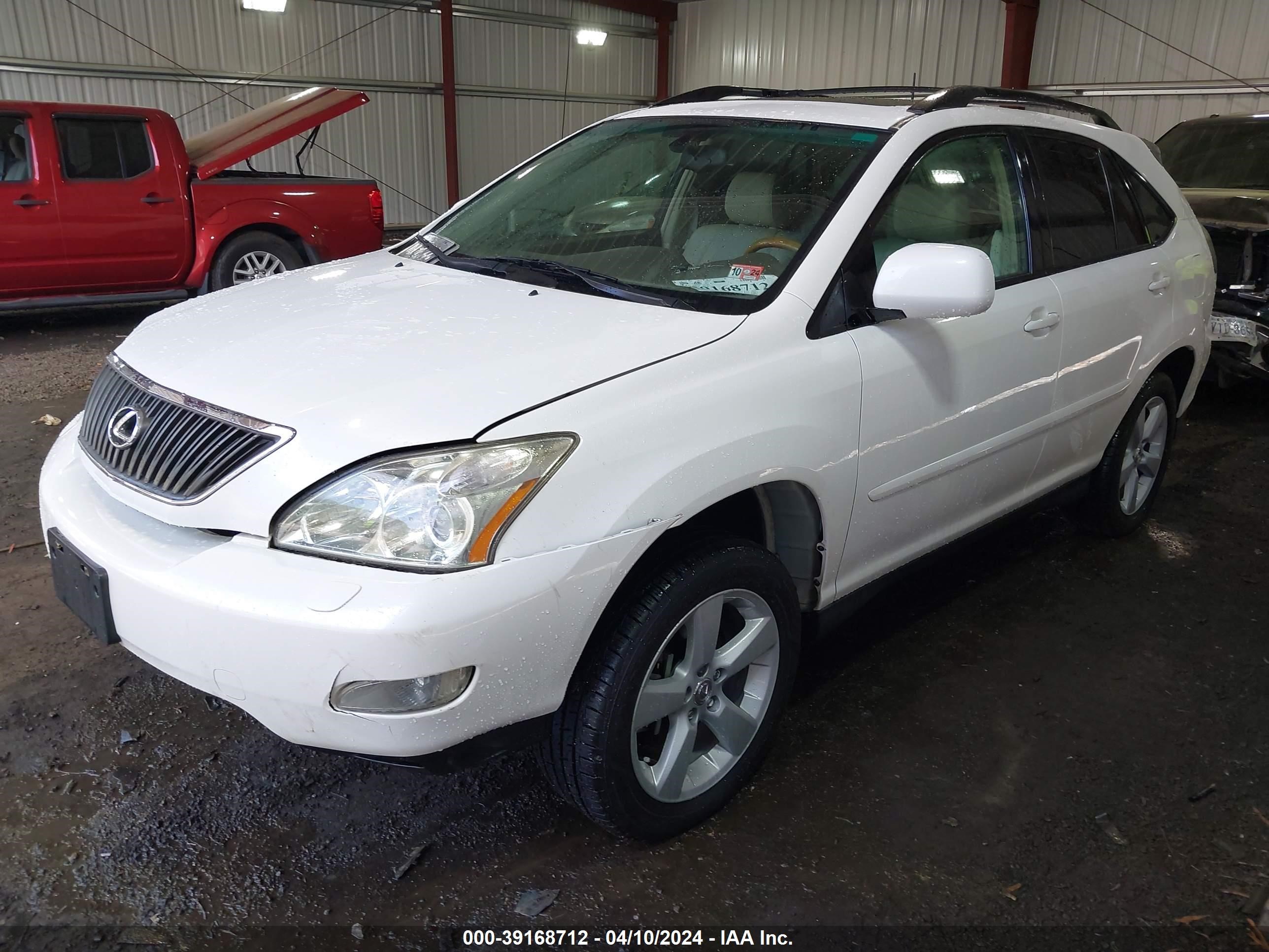 Photo 1 VIN: 2T2HA31UX6C095289 - LEXUS RX 