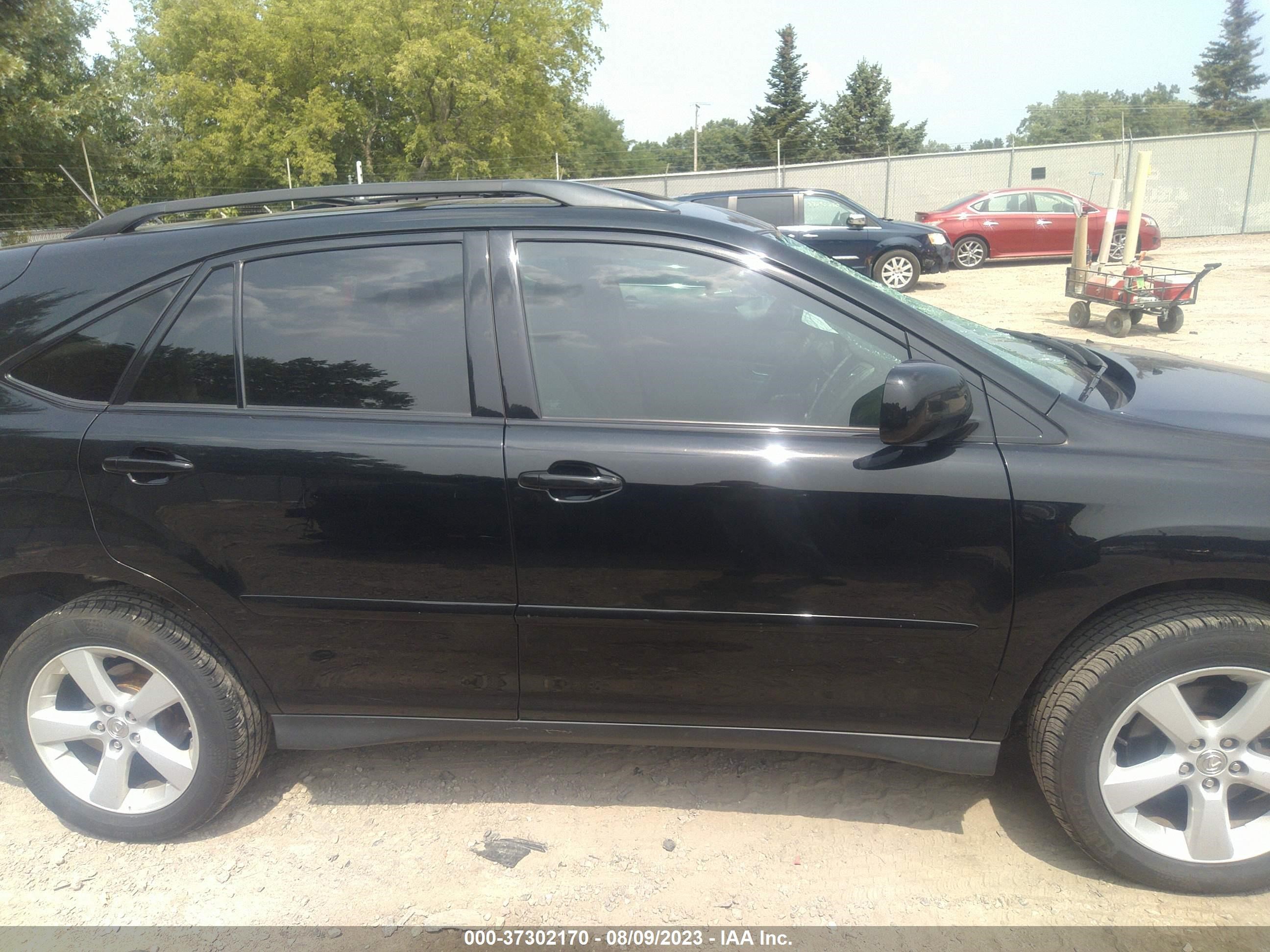 Photo 12 VIN: 2T2HK31U27C029432 - LEXUS RX 