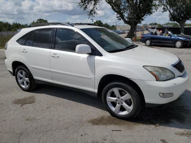 Photo 3 VIN: 2T2HK31U77C033136 - LEXUS RX 350 