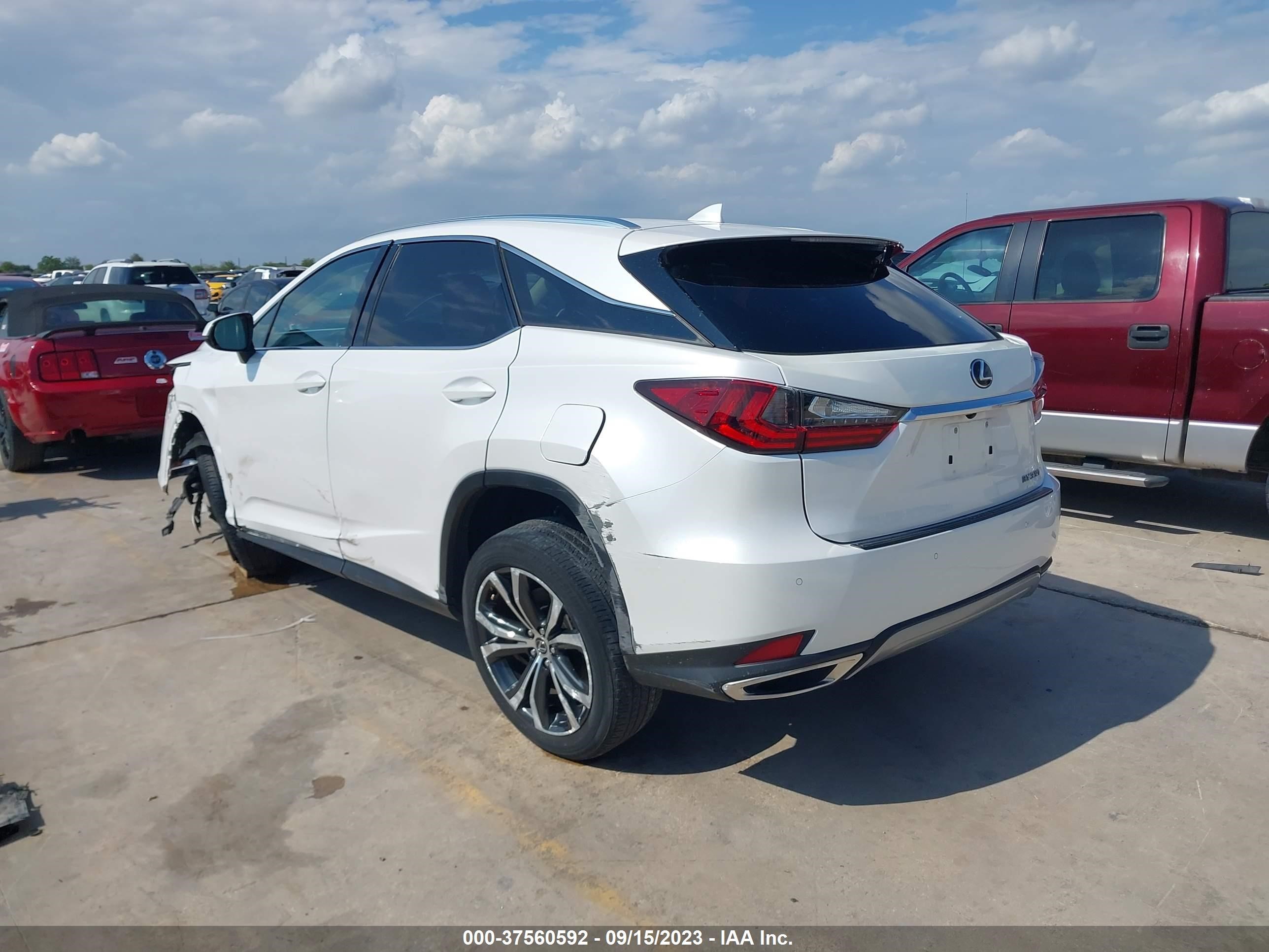 Photo 2 VIN: 2T2HZMAA7MC200694 - LEXUS RX 