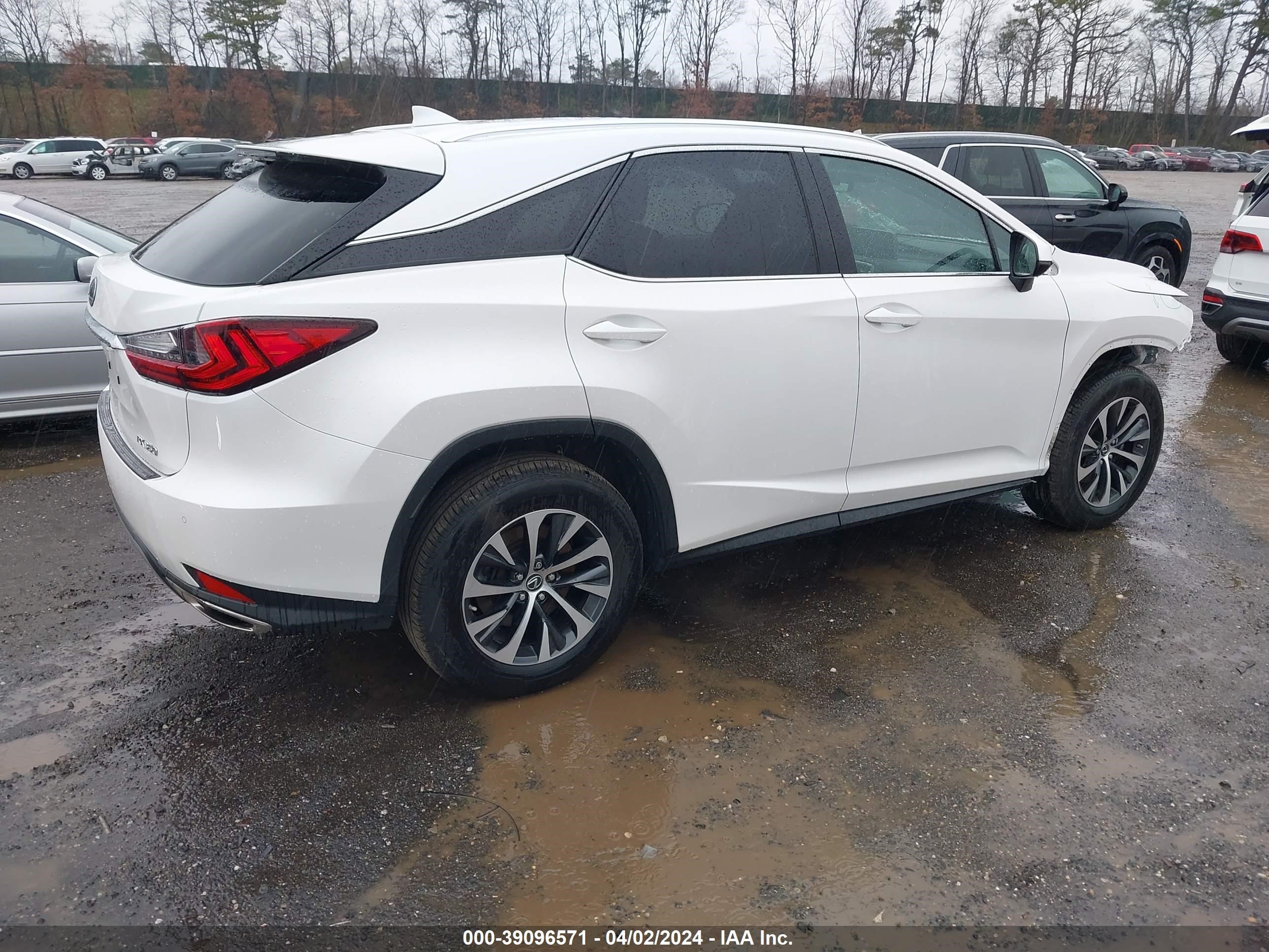 Photo 3 VIN: 2T2HZMDA7LC243250 - LEXUS RX 