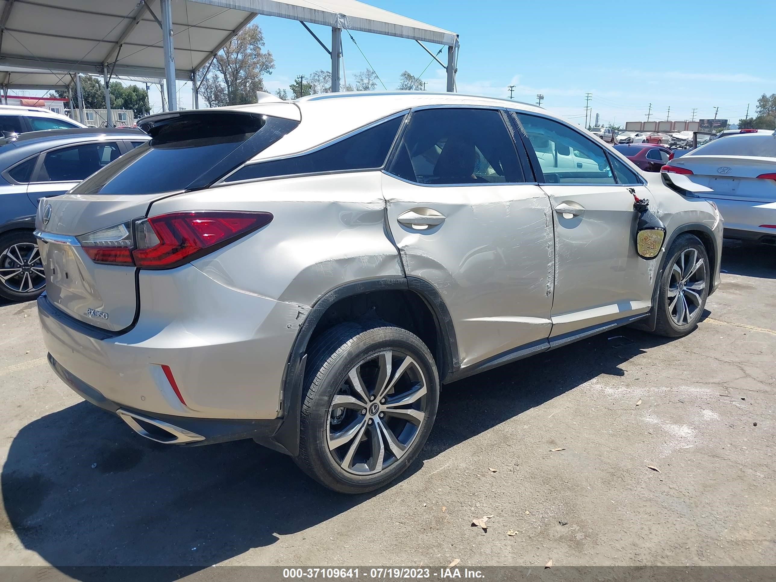 Photo 3 VIN: 2T2ZZMCA5JC097417 - LEXUS RX 