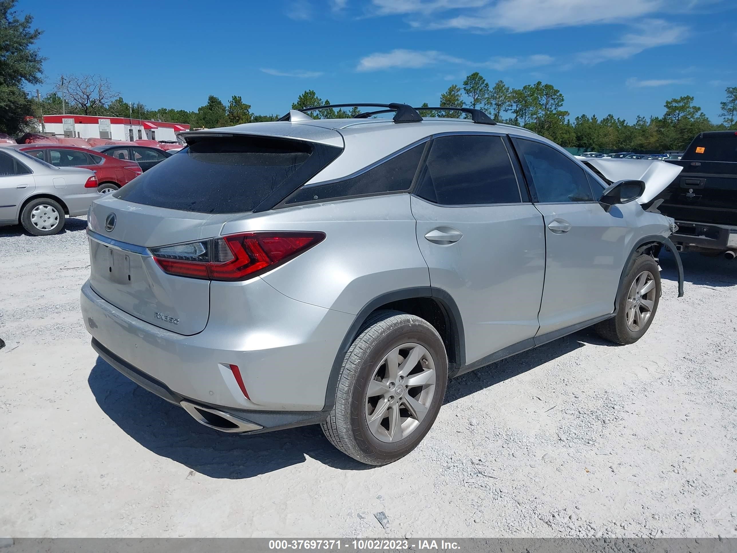 Photo 3 VIN: 2T2ZZMCA6GC005563 - LEXUS RX 