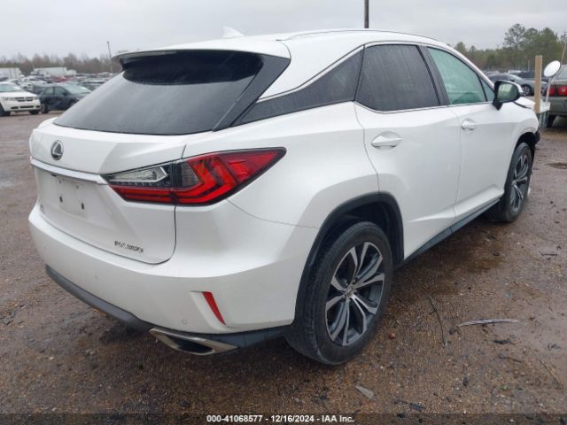 Photo 3 VIN: 2T2ZZMCA7GC019441 - LEXUS RX 