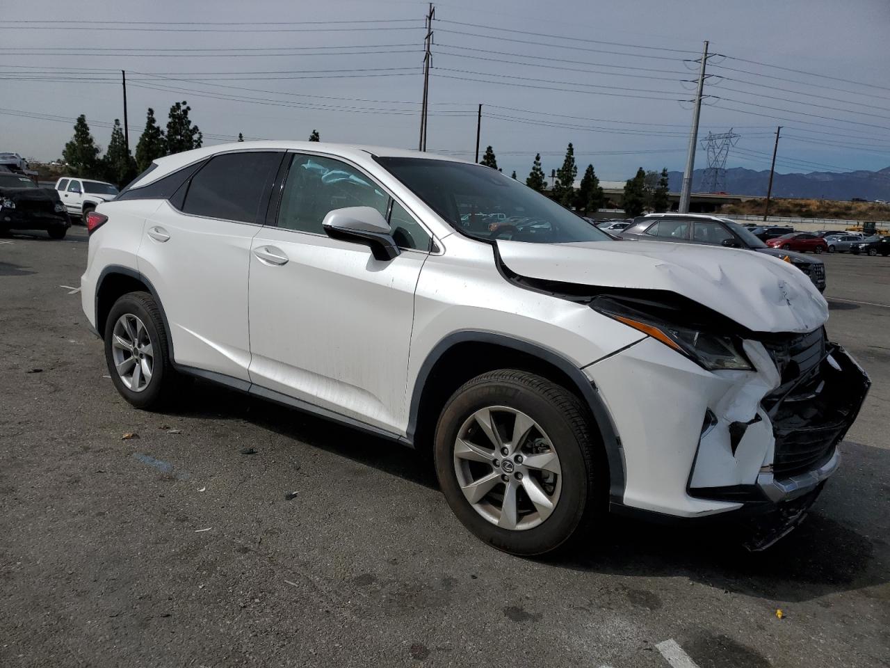 Photo 3 VIN: 2T2ZZMCA7KC137031 - LEXUS RX 