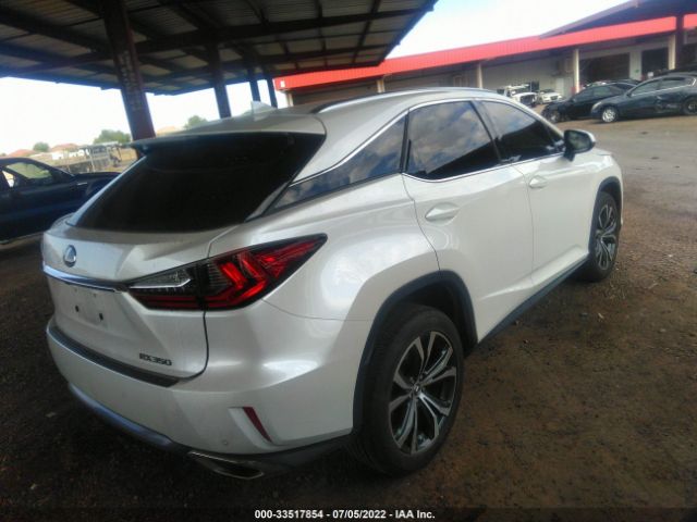 Photo 3 VIN: 2T2ZZMCA8JC106093 - LEXUS RX 