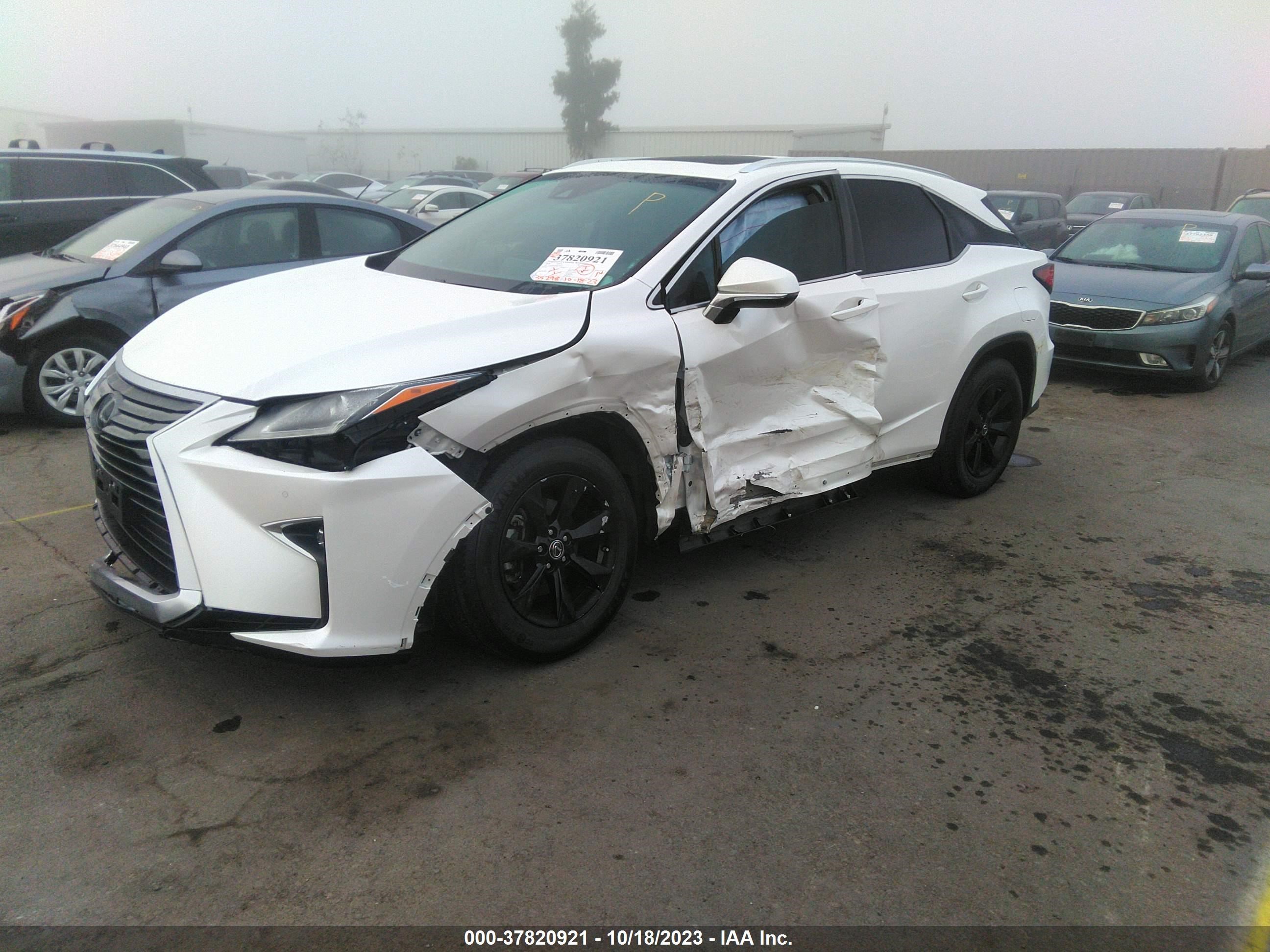 Photo 1 VIN: 2T2ZZMCAXKC149531 - LEXUS RX 