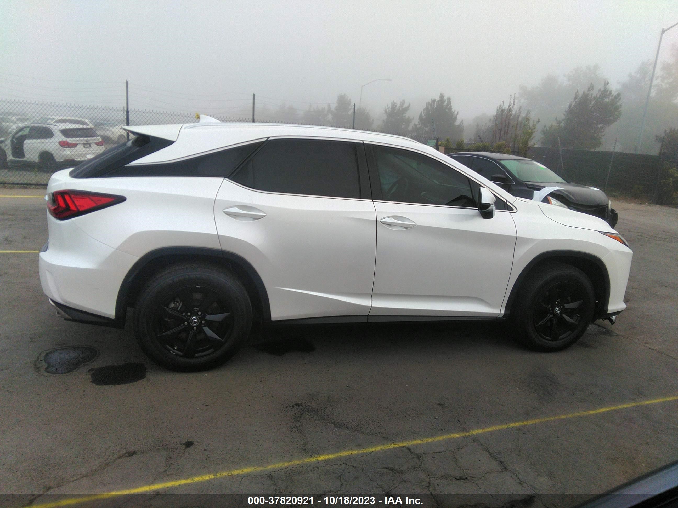 Photo 12 VIN: 2T2ZZMCAXKC149531 - LEXUS RX 