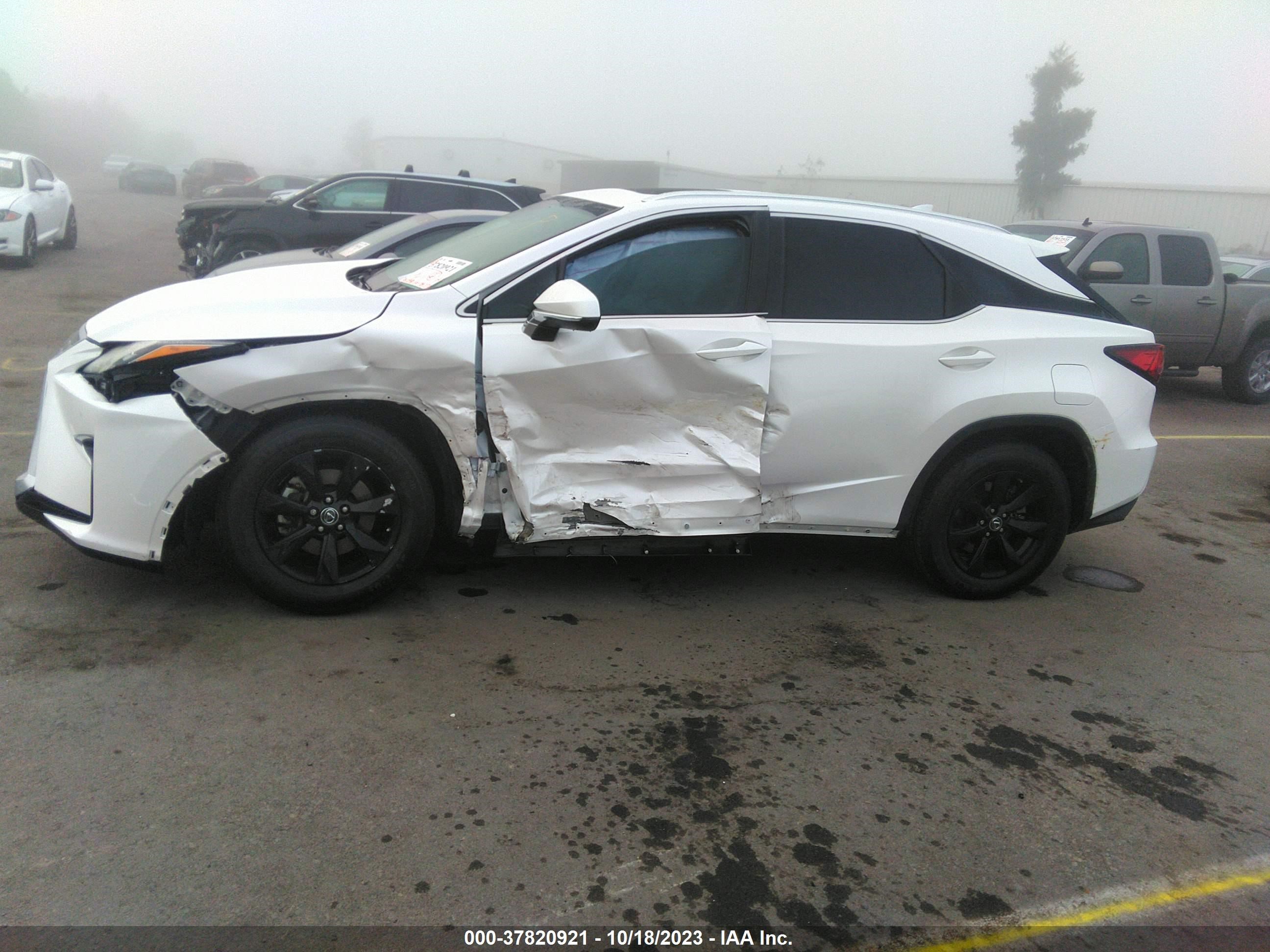 Photo 13 VIN: 2T2ZZMCAXKC149531 - LEXUS RX 