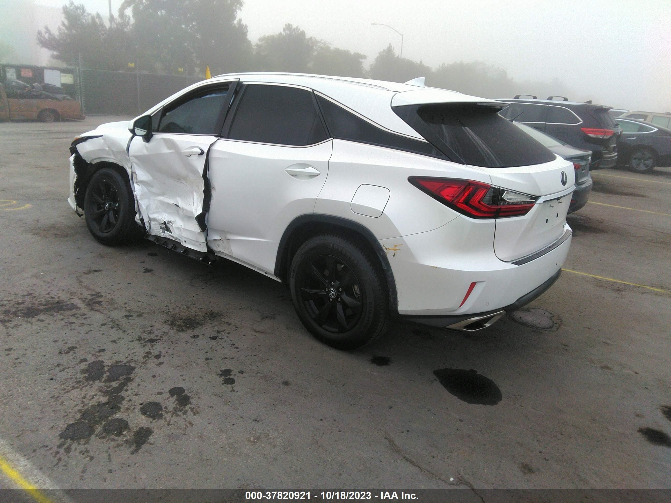 Photo 2 VIN: 2T2ZZMCAXKC149531 - LEXUS RX 