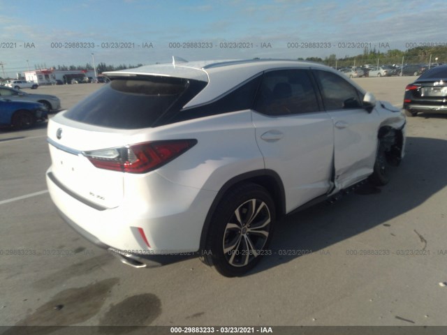 Photo 3 VIN: 2T2ZZMCAXKC150419 - LEXUS RX 