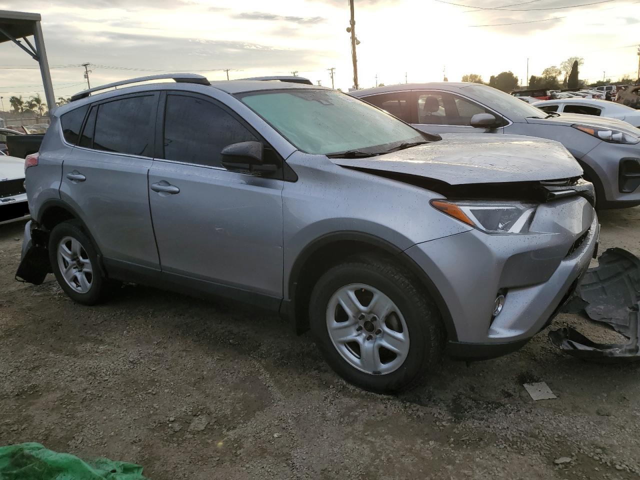 Photo 3 VIN: 2T3BFREV0HW660000 - TOYOTA RAV4 LE 