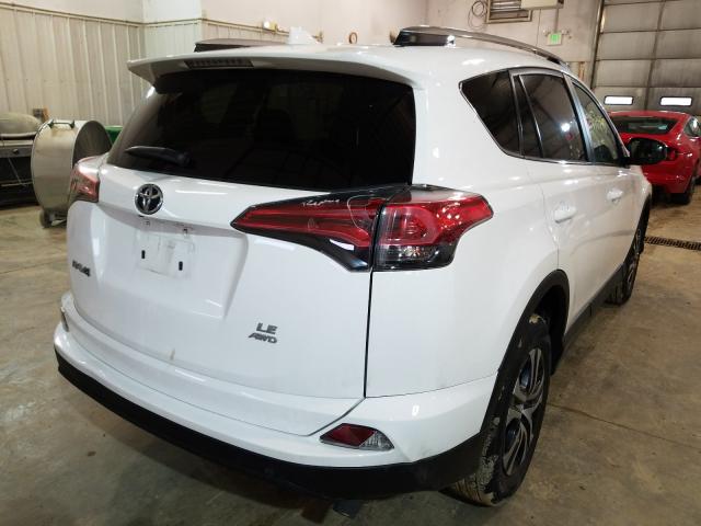 Photo 3 VIN: 2T3BFREV0JW810225 - TOYOTA RAV4 LE 