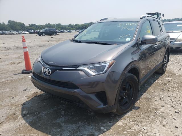 Photo 1 VIN: 2T3BFREV2GW516740 - TOYOTA RAV4 LE 