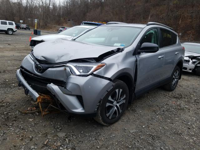 Photo 1 VIN: 2T3BFREV2JW713804 - TOYOTA RAV4 LE 