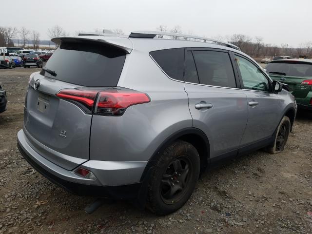 Photo 3 VIN: 2T3BFREV2JW713804 - TOYOTA RAV4 LE 