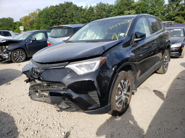 Photo 1 VIN: 2T3BFREV2JW737648 - TOYOTA RAV4 LE 