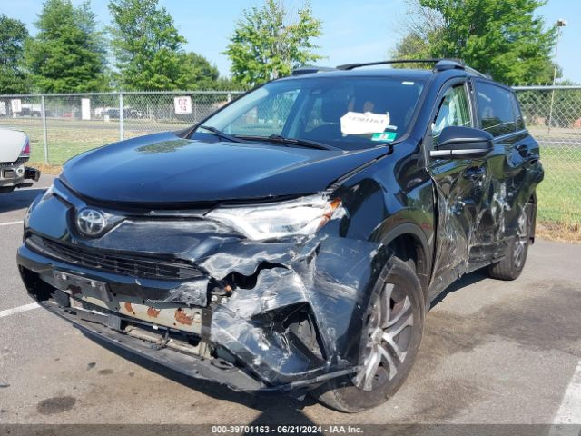 Photo 1 VIN: 2T3BFREV2JW756751 - TOYOTA RAV4 