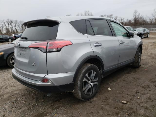 Photo 3 VIN: 2T3BFREV3JW844482 - TOYOTA RAV4 LE 