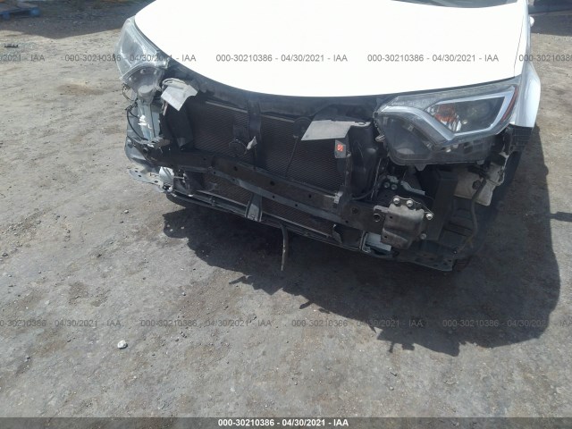 Photo 5 VIN: 2T3BFREV4GW493509 - TOYOTA RAV4 