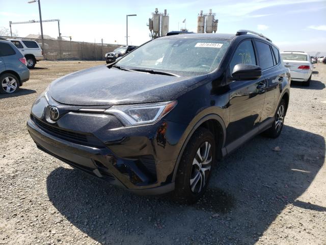 Photo 1 VIN: 2T3BFREV4JW715070 - TOYOTA RAV4 LE 