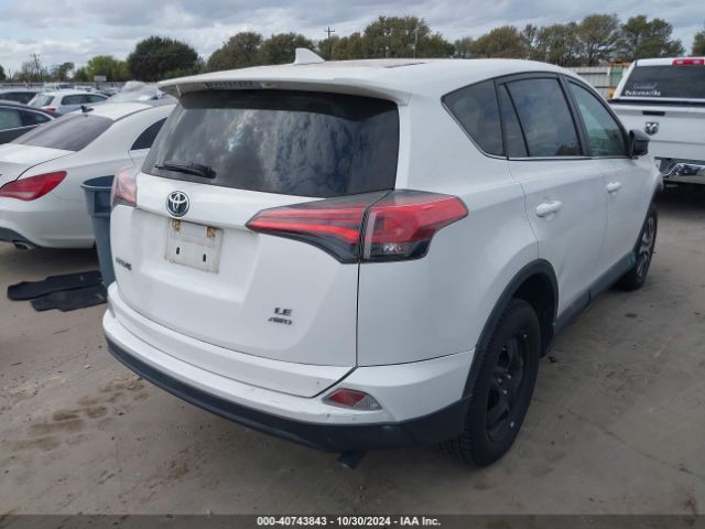 Photo 3 VIN: 2T3BFREV4JW777519 - TOYOTA RAV4 