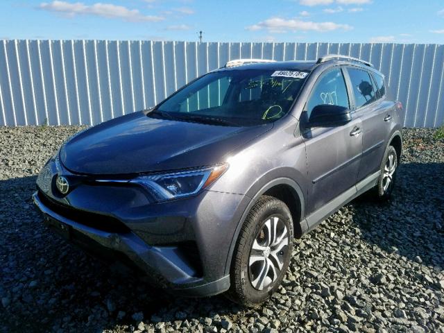 Photo 1 VIN: 2T3BFREV5JW747056 - TOYOTA RAV4 LE 