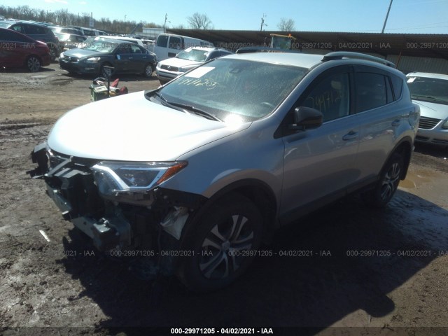 Photo 1 VIN: 2T3BFREV8JW701589 - TOYOTA RAV4 