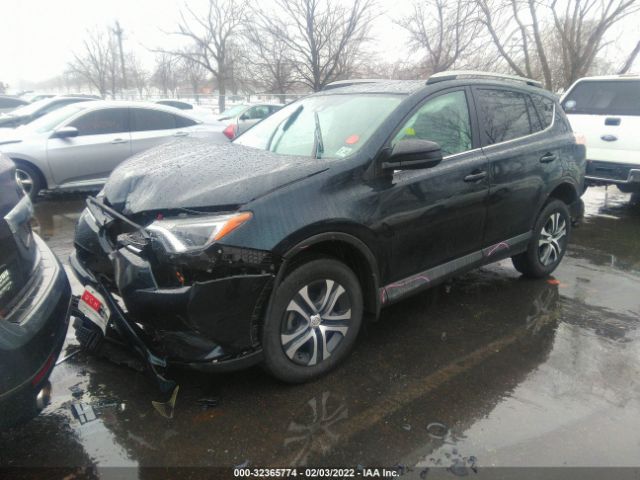 Photo 1 VIN: 2T3BFREV8JW809517 - TOYOTA RAV4 