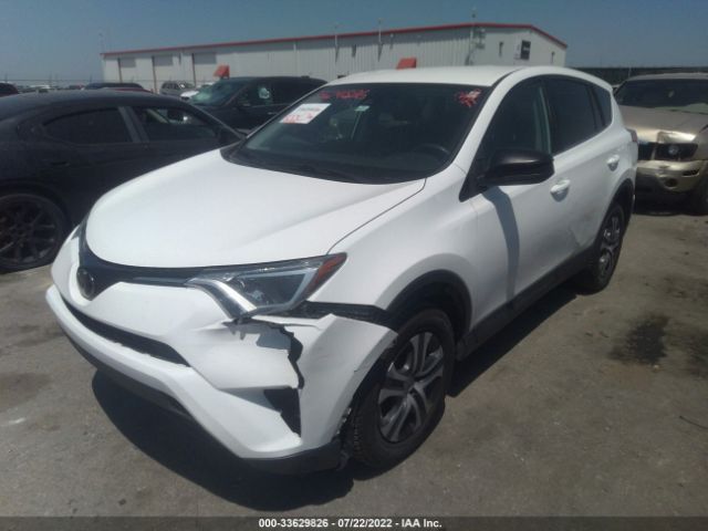 Photo 1 VIN: 2T3BFREV9JW717591 - TOYOTA RAV4 