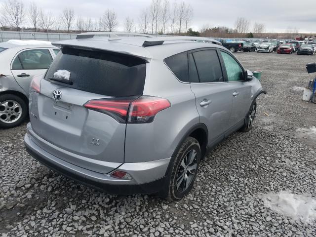 Photo 3 VIN: 2T3BFREV9JW739056 - TOYOTA RAV4 LE 