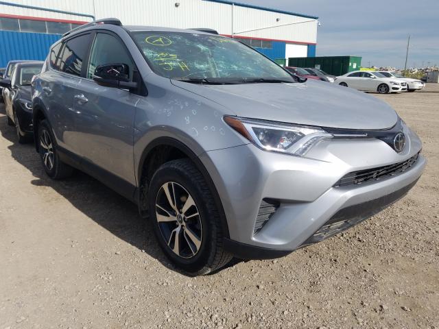 Photo 0 VIN: 2T3BFREV9JW765981 - TOYOTA RAV4 LE 