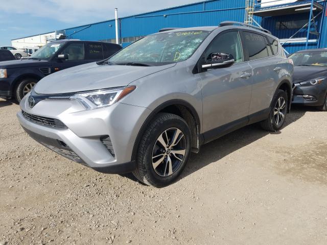 Photo 1 VIN: 2T3BFREV9JW765981 - TOYOTA RAV4 LE 