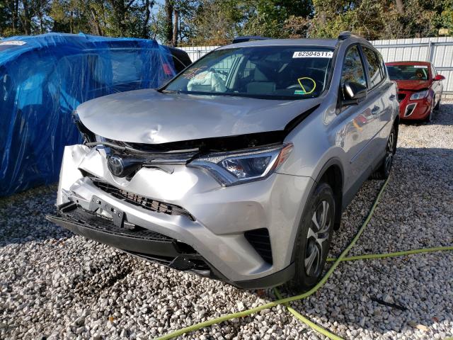 Photo 1 VIN: 2T3BFREV9JW779511 - TOYOTA RAV4 LE 