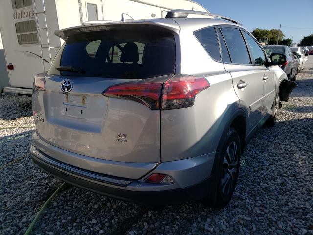 Photo 3 VIN: 2T3BFREV9JW779511 - TOYOTA RAV4 LE 