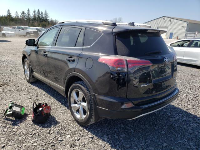 Photo 2 VIN: 2T3BFREV9JW812541 - TOYOTA RAV4 LE 