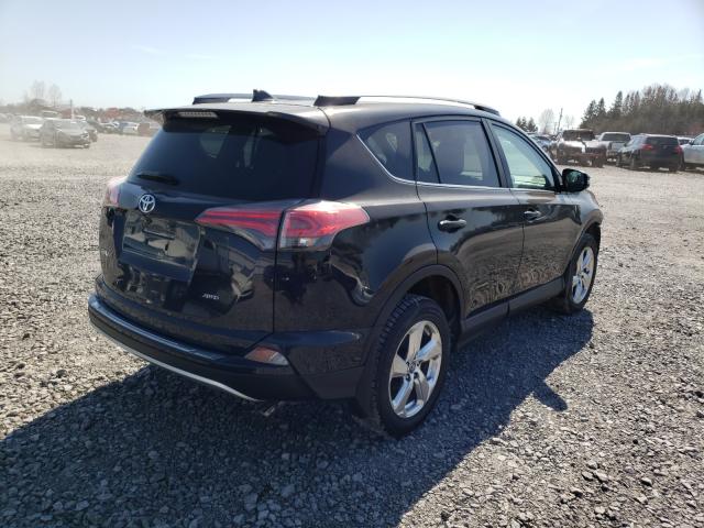 Photo 3 VIN: 2T3BFREV9JW812541 - TOYOTA RAV4 LE 