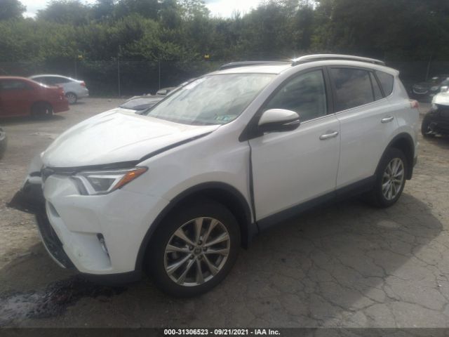 Photo 1 VIN: 2T3DFREV7JW730218 - TOYOTA RAV4 