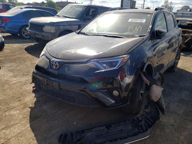 Photo 1 VIN: 2T3JFREV0GW504307 - TOYOTA RAV4 SE 