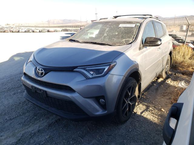 Photo 1 VIN: 2T3JFREV2GW477725 - TOYOTA RAV4 SE 