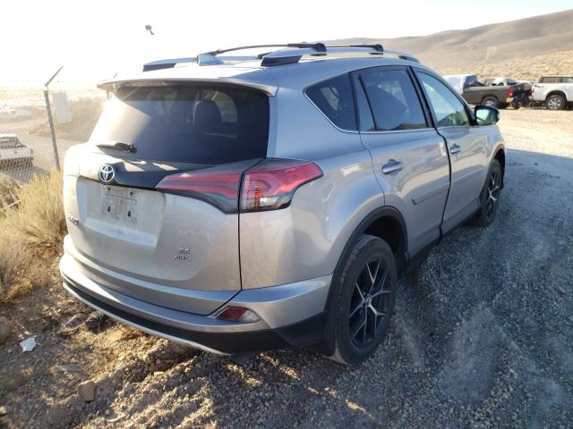 Photo 3 VIN: 2T3JFREV2GW477725 - TOYOTA RAV4 SE 