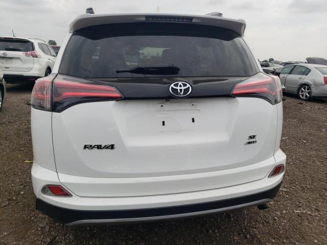 Photo 5 VIN: 2T3JFREV3HW656213 - TOYOTA RAV4 SE 