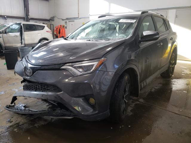 Photo 1 VIN: 2T3JFREV3JW851637 - TOYOTA RAV4 SE 