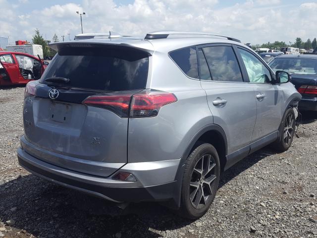 Photo 3 VIN: 2T3JFREV4JW724380 - TOYOTA RAV4 SE 