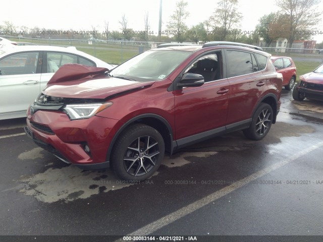 Photo 1 VIN: 2T3JFREV4JW754379 - TOYOTA RAV4 