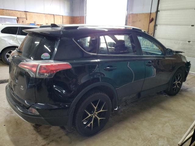 Photo 2 VIN: 2T3JFREV5GW494700 - TOYOTA RAV4 SE 